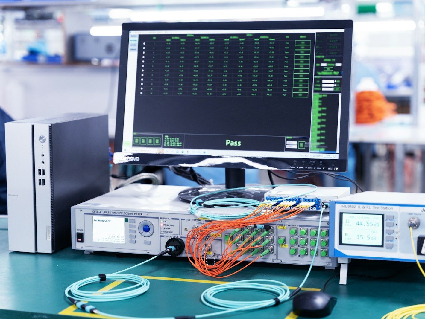 a computer monitor sitting on top of a table