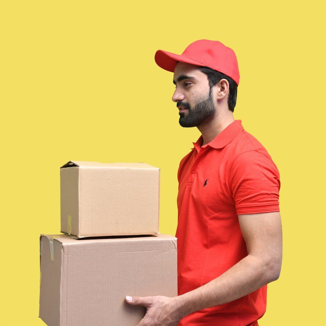 a man wearing a red hat